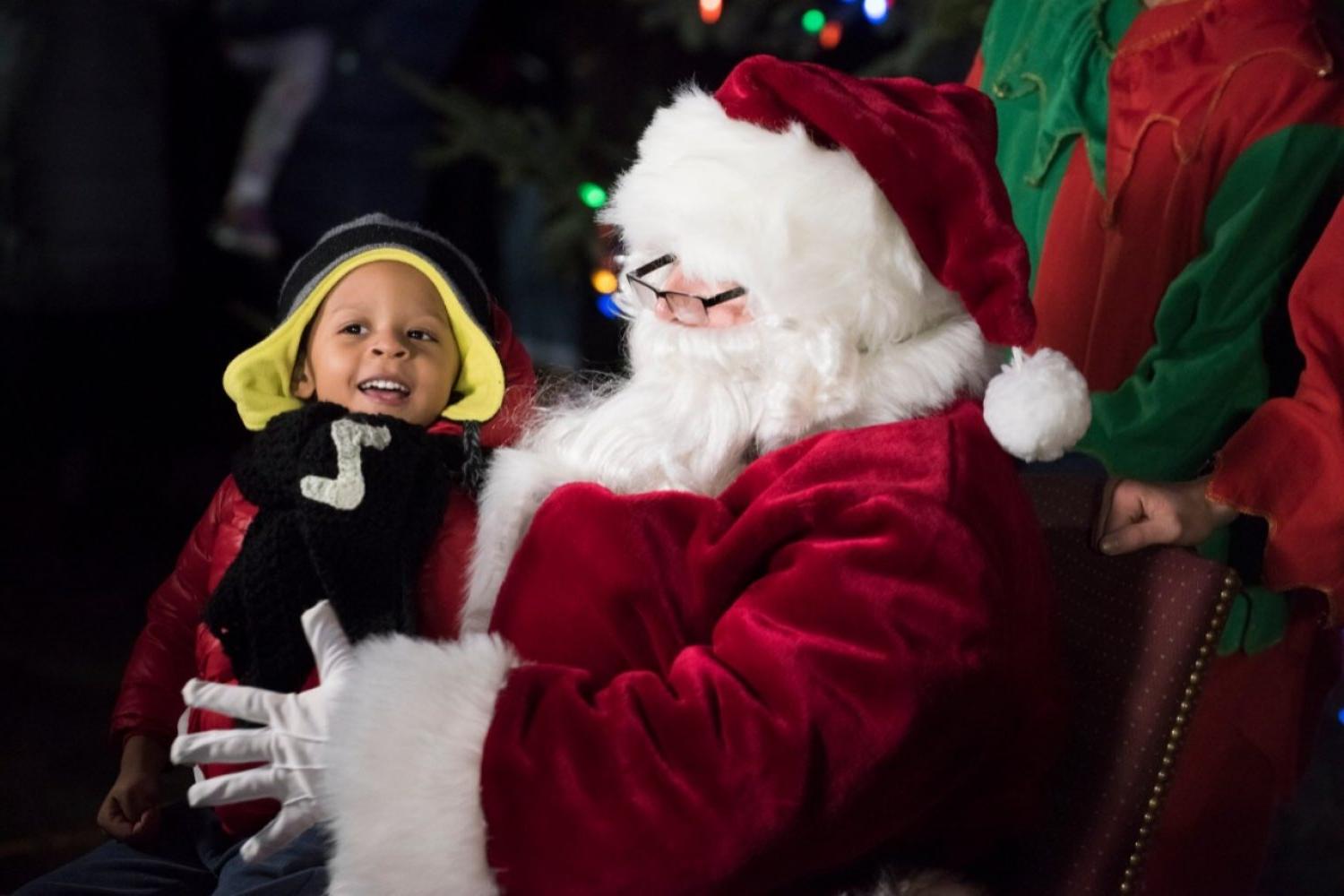 A child with Santa